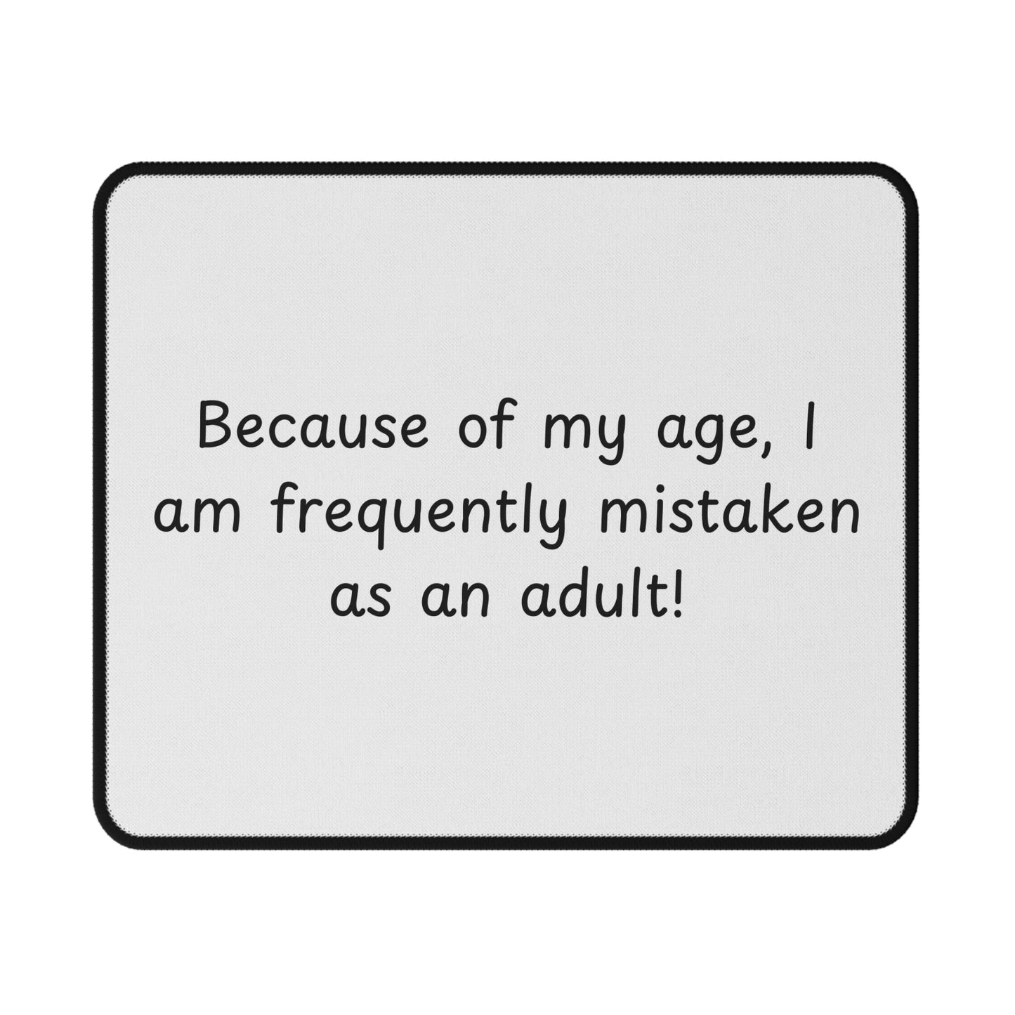 Non-Slip Gaming Mouse Pad — "Because of my age, I am frequently mistaken as an adult!" Funny Desk Mat for Gamers & Office