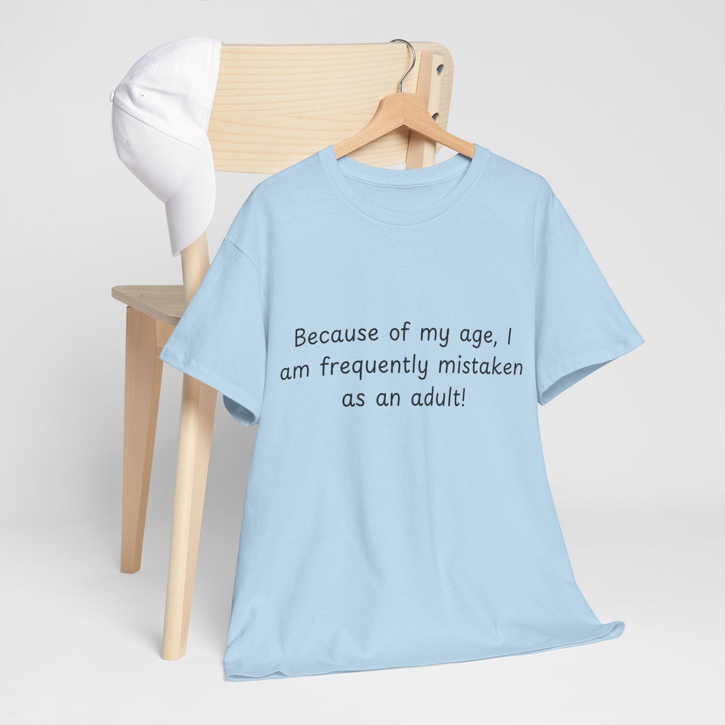 Funny Quote T-Shirt — "Because of my age, I am frequently mistaken as an adult!"