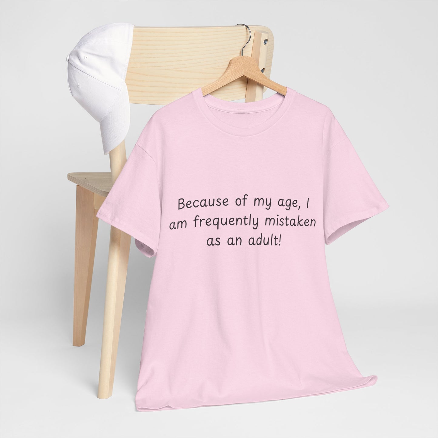 Funny Quote T-Shirt — "Because of my age, I am frequently mistaken as an adult!"