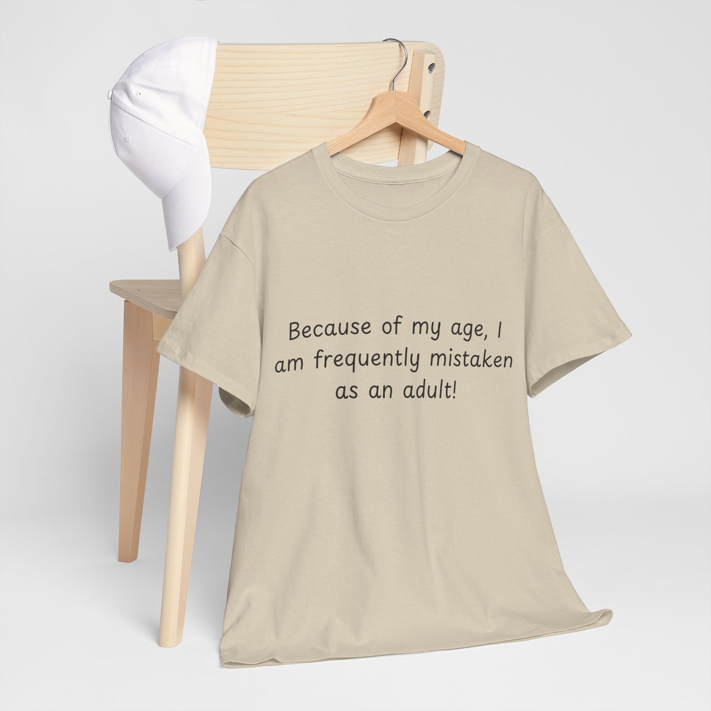 Funny Quote T-Shirt — "Because of my age, I am frequently mistaken as an adult!"